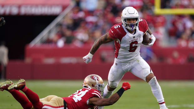 Nov 7, 2021; Santa Clara, California, USA; Arizona Cardinals running back James Conner (6) eludes San Francisco 49ers defensive back K'Waun Williams (24) in the third quarter at Levi's Stadium. Mandatory Credit: Cary Edmondson-USA TODAY Sports